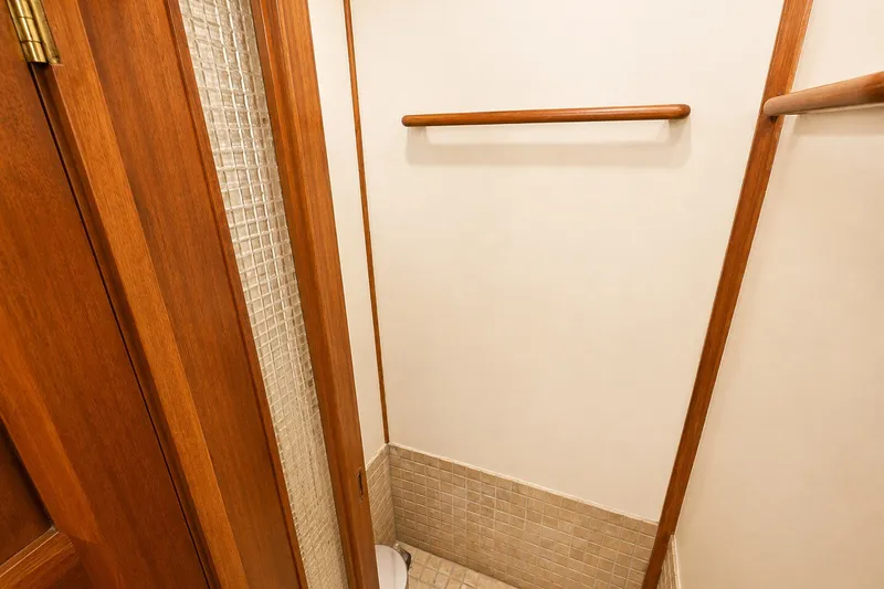 Slide: The Image of 1986 Marine Trader Labelle shower with wooden accents and tiled walls. - 29