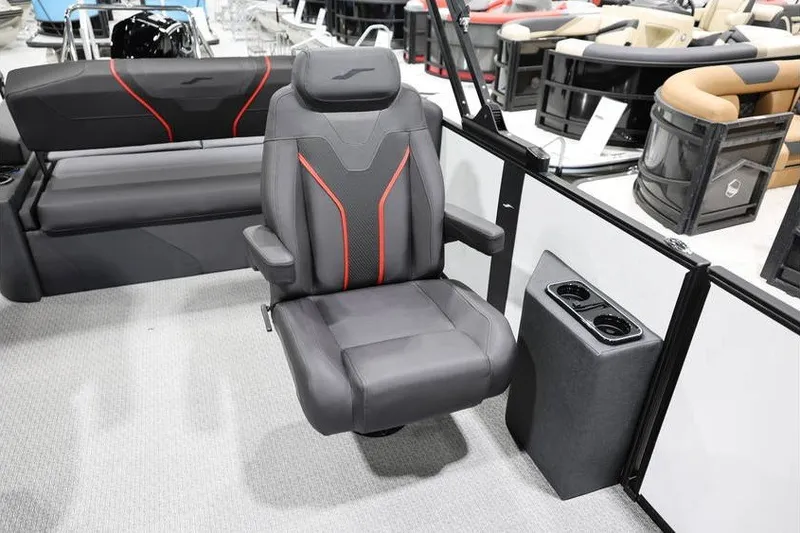 Slide: The Image of Luxurious seating in the 2026 Evotti 723CS boat, featuring sleek design and cup holders. - 10