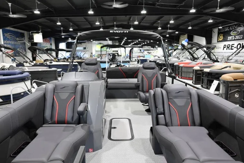 Slide: The Image of Luxurious 2026 Evotti 723CS boat interior with sleek seating in a showroom setting. - 7