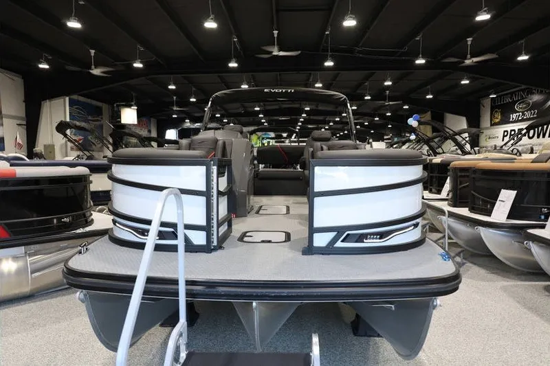 Slide: The Image of Evotti 723CS 2026 pontoon boat displayed in a showroom with modern interior. - 3