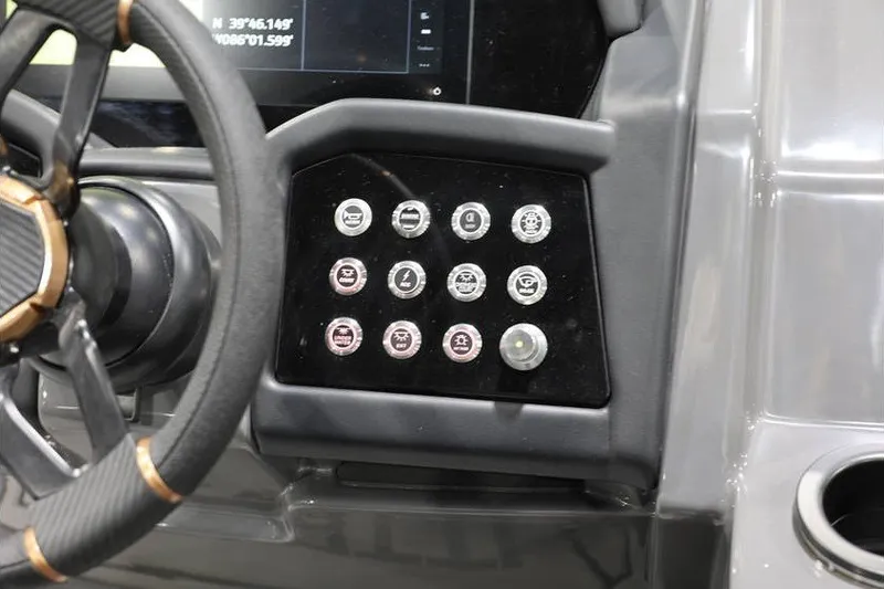 Slide: The Image of Steering wheel and control panel of 2026 Evotti 723CS vehicle interior. - 13