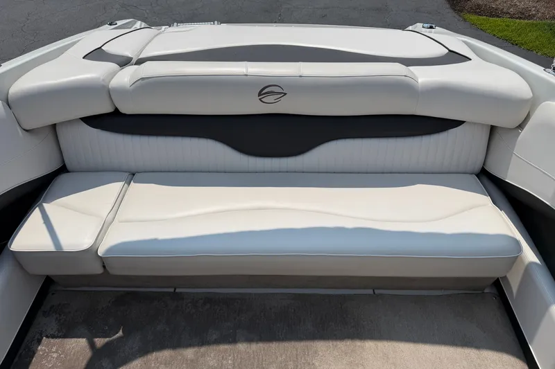 Slide: The Image of 2015 Crownline 21 SS boat interior with white cushioned seating. - 6