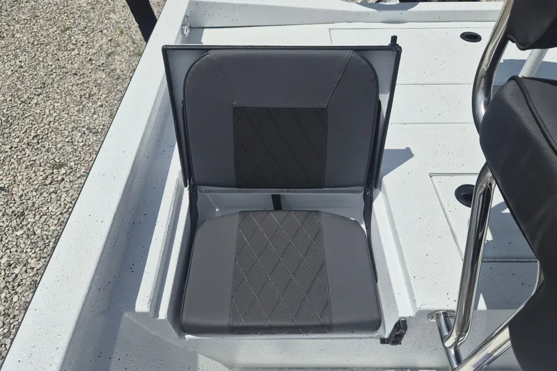 Slide: The Image of 2026 Xpress H22 Bay boat seat with diamond-patterned upholstery. - 11
