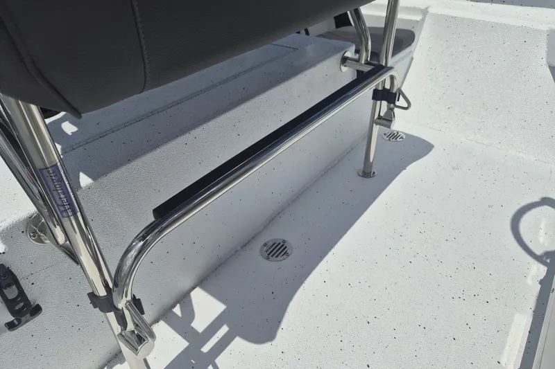 Slide: The Image of 2026 Xpress H22 Bay boat interior with stainless steel fittings and non-slip flooring. - 12