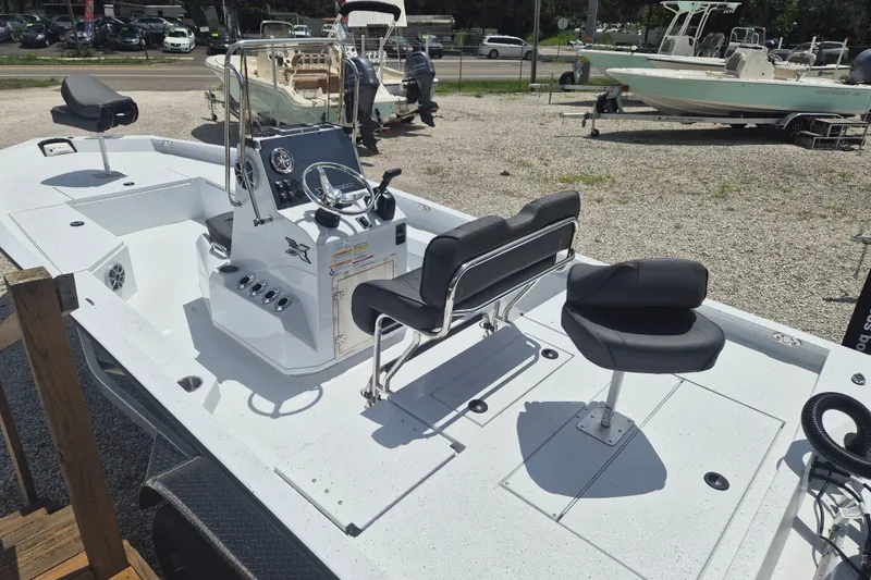 Slide: The Image of 2026 Xpress H22 Bay boat with sleek design and modern seating arrangement. - 5