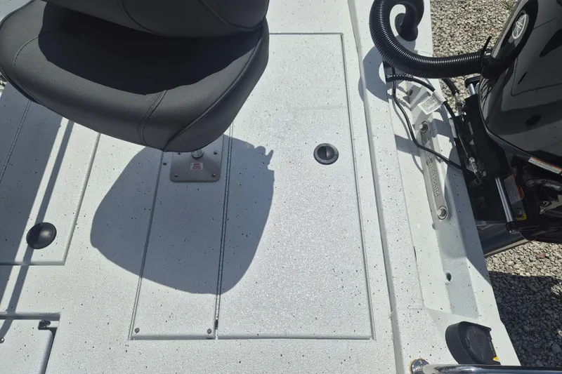 Slide: The Image of 2026 Xpress H22 Bay boat deck with seat and motor detail. - 9