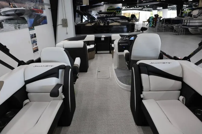 Slide: The Image of 2026 South Bay 224 RS Tritoon interior with luxurious seating and modern design. - 13