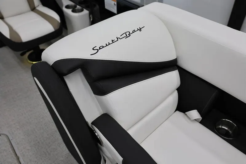 Slide: The Image of 2026 South Bay 224 RS Tritoon luxury seating with elegant black and white design. - 27
