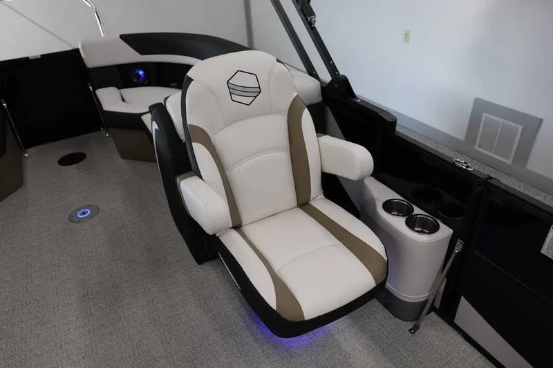 Slide: The Image of Luxurious seating on 2026 South Bay 224 RS Tritoon with cup holders and modern design. - 20
