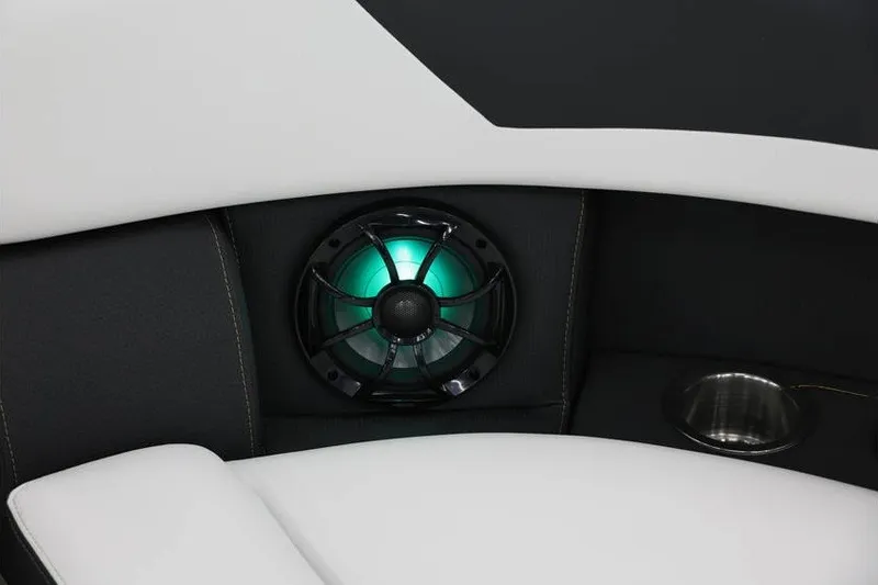 Slide: The Image of 2026 South Bay 224 RS Tritoon interior with illuminated speaker and cup holder. - 28