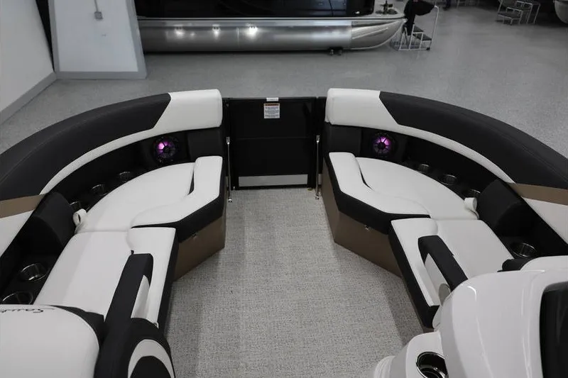 Slide: The Image of Interior of 2026 South Bay 224 RS Tritoon with luxurious seating and modern design. - 22