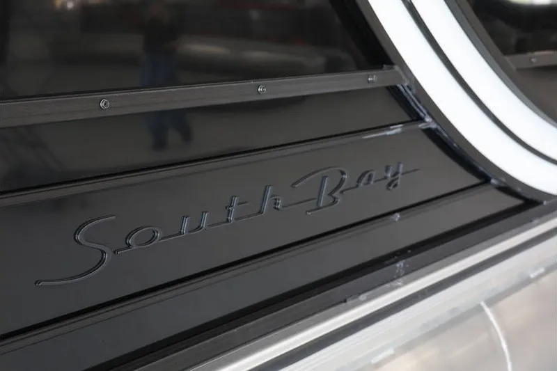 Slide: The Image of 2026 South Bay 224 RS Tritoon logo on sleek black surface. - 30