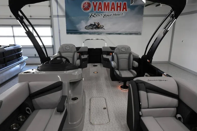 Slide: The Image of Interior view of 2026 South Bay 224 RS 2.75 Hybrid Arch pontoon boat in showroom. - 16