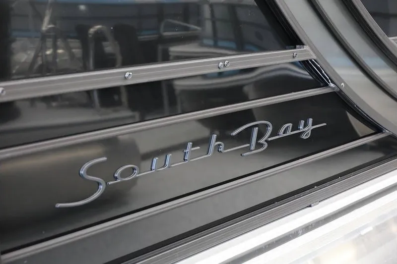 Slide: The Image of Close-up of 2026 South Bay 224 RS 2.75 Hybrid Arch logo on sleek black surface. - 19