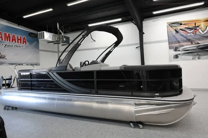 The Image of 2026 South Bay 224 RS 2.75 Hybrid Arch pontoon boat in showroom. - 1