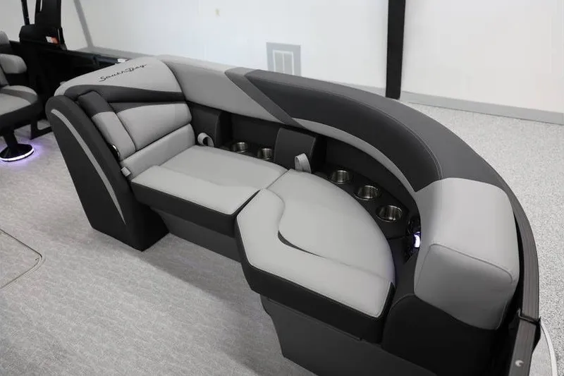 Slide: The Image of Luxurious seating in 2026 South Bay 224 RS 2.75 Hybrid Arch boat interior. - 15