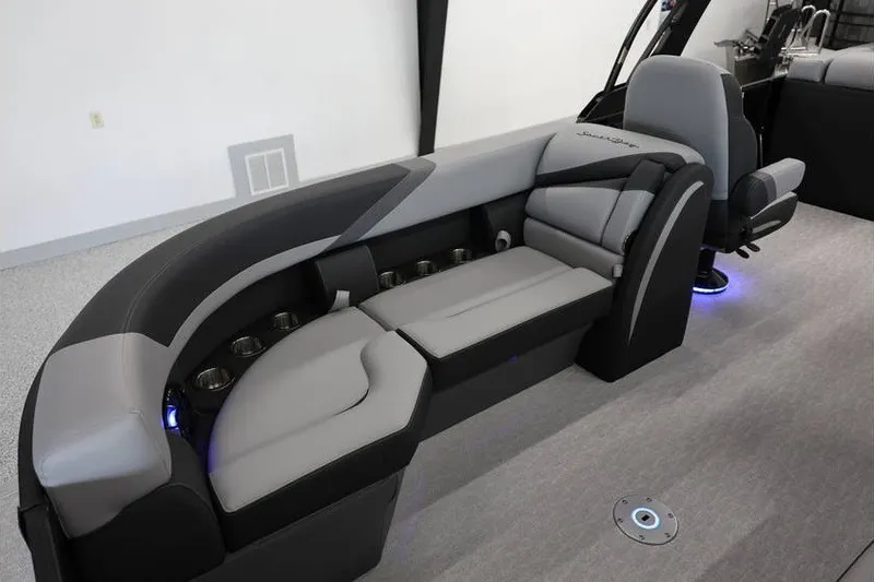 Slide: The Image of Luxurious seating in the 2026 South Bay 224 RS 2.75 Hybrid Arch boat interior. - 9