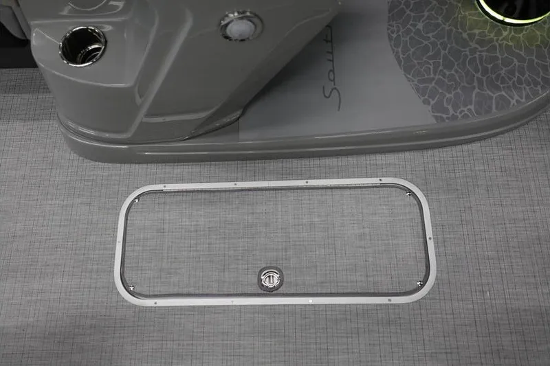 Slide: The Image of 2026 South Bay 224 RS 2.75 Hybrid Arch boat interior with sleek flooring and cup holder. - 18