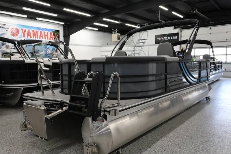 Slide: The Image of 2026 South Bay 224 RS 2.75 Hybrid Arch pontoon boat in showroom. - 6