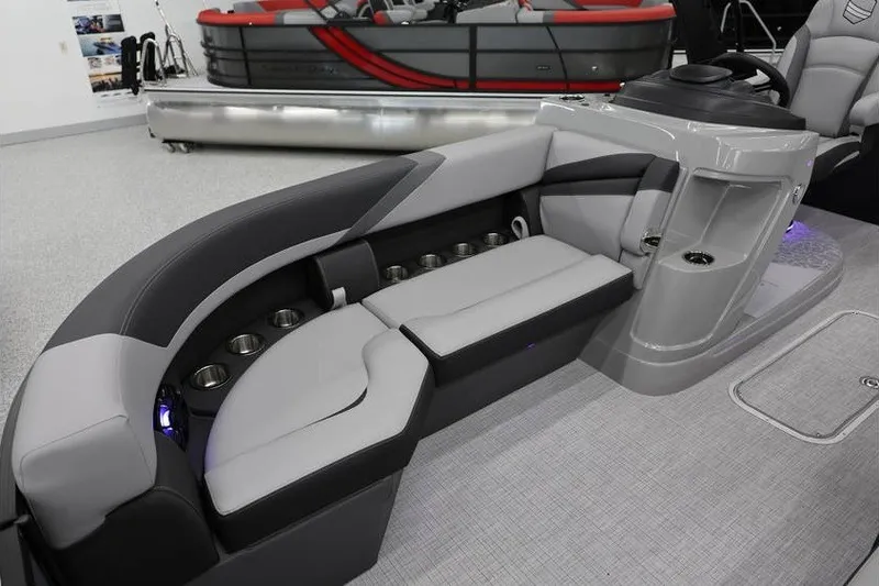 Slide: The Image of 2026 South Bay 224 RS 2.75 Hybrid Arch boat interior with sleek seating and modern design. - 16
