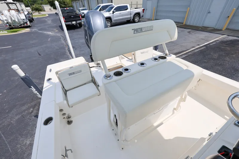 Slide: The Image of 2017 Pathfinder 2200 TRS boat interior with seating and rod holders. - 10