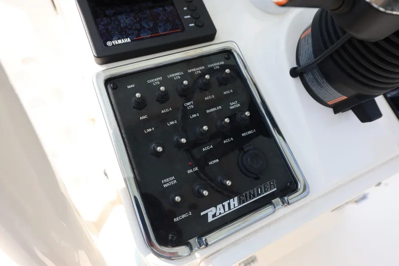 Slide: The Image of Control panel of a 2017 Pathfinder 2200 TRS boat with Yamaha electronics. - 15