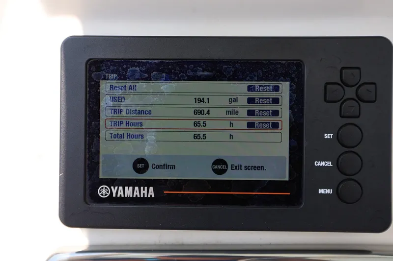 Slide: The Image of Yamaha display showing trip data: 194.1 gallons used, 690.4 miles traveled, 65.5 hours total. - 14