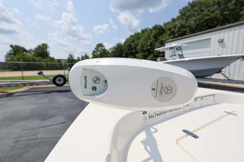 Slide: The Image of 2017 Pathfinder 2200 TRS boat with i-Pilot Riptide trolling motor, parked outdoors. - 18