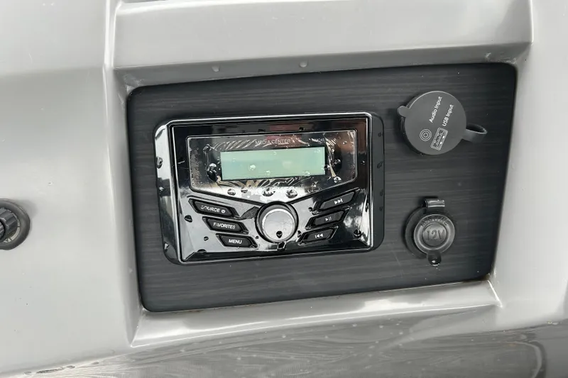 Slide: The Image of Control panel of a 2020 Bennington 23 SX boat with media center and USB input. - 9