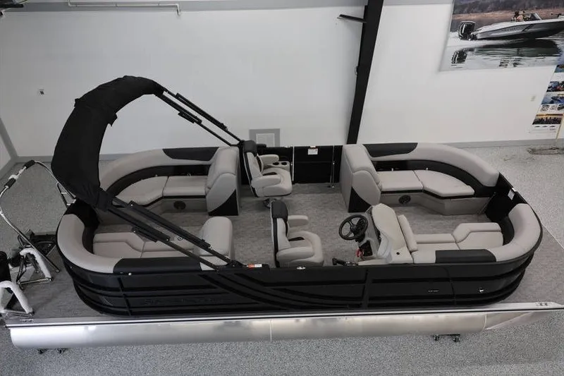 The Image of 2027 South Bay LE 224 RS 2.75 JAWS Edition pontoon boat with sleek seating and canopy. - 1