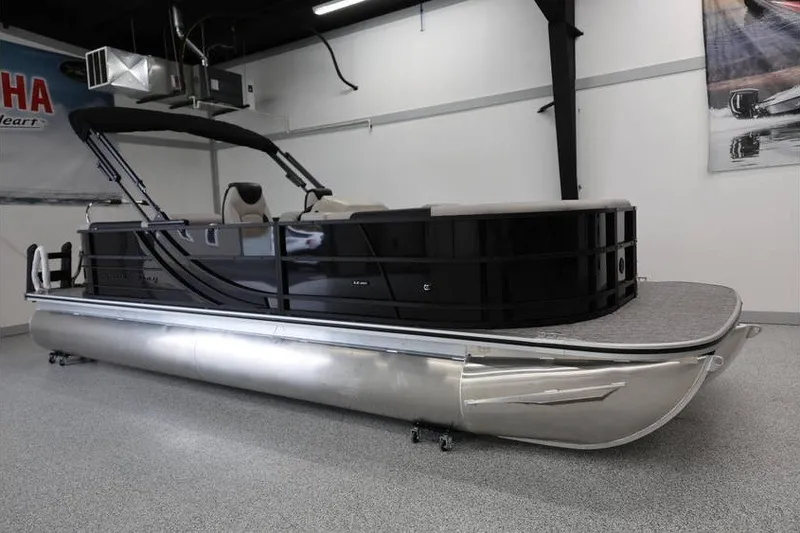 Slide: The Image of 2027 South Bay LE 224 RS 2.75 JAWS Edition pontoon boat in showroom. - 4