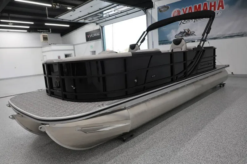 Slide: The Image of 2027 South Bay LE 224 RS 2.75 JAWS Edition pontoon boat in showroom. - 7