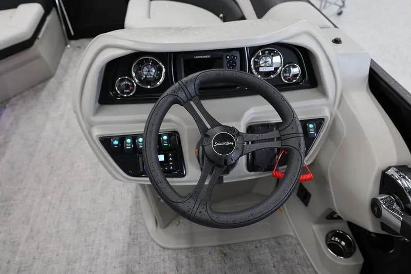 Slide: The Image of Steering console of 2027 South Bay LE 224 RS 2.75 JAWS Edition boat. - 15
