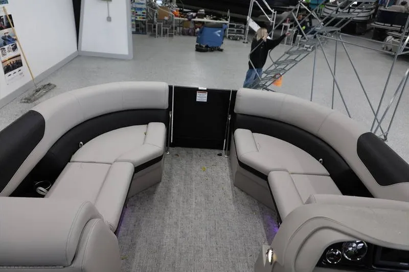 Slide: The Image of 2027 South Bay LE 224 RS 2.75 JAWS Edition pontoon boat interior with plush seating. - 18