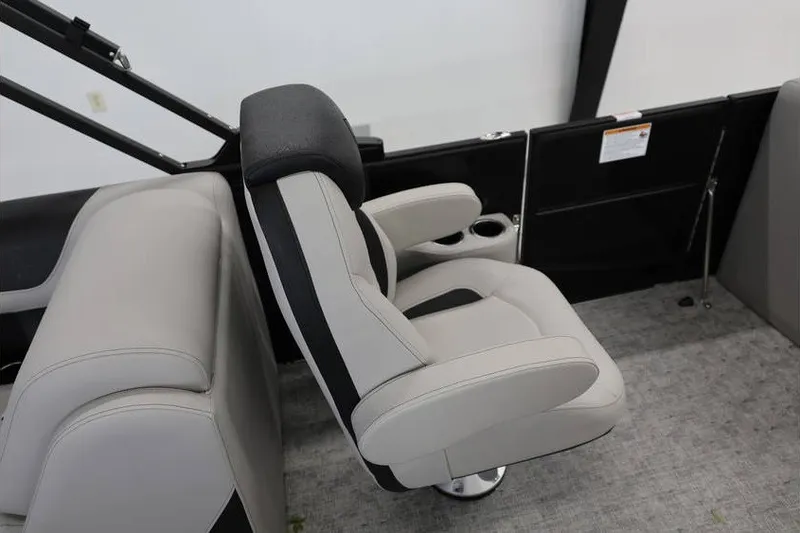 Slide: The Image of Luxurious seating in 2027 South Bay LE 224 RS 2.75 JAWS Edition boat interior. - 16