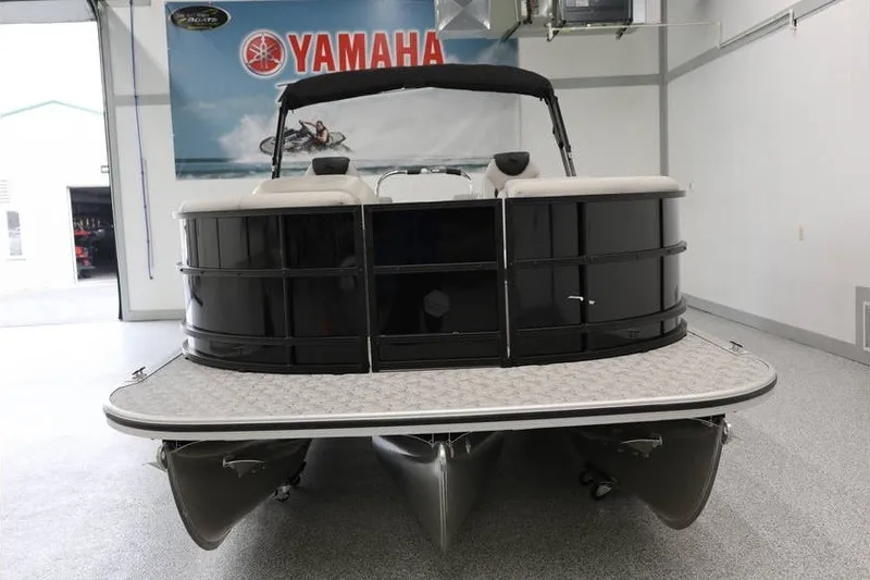 Slide: The Image of 2027 South Bay LE 224 RS 2.75 JAWS Edition pontoon boat in showroom. - 5