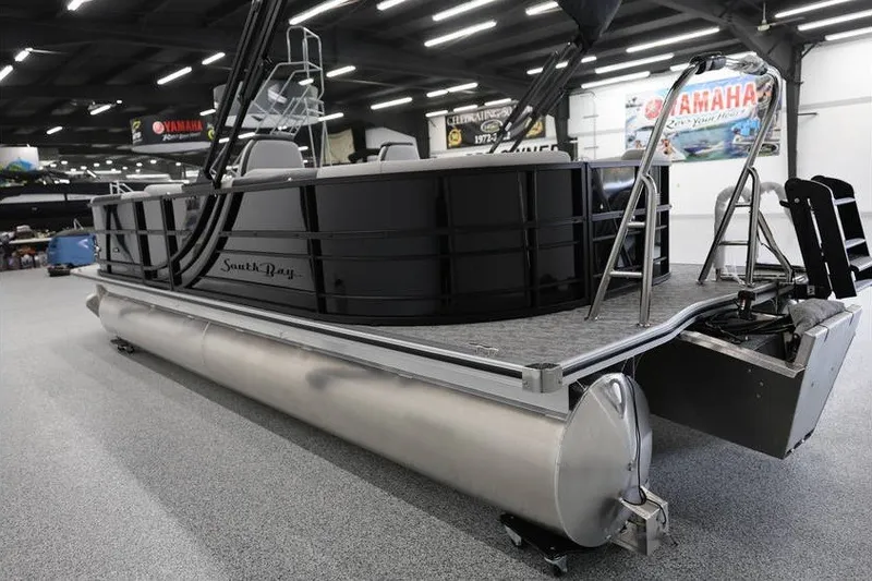 Slide: The Image of 2027 South Bay LE 224 RS 2.75 JAWS Edition pontoon boat in showroom. - 8
