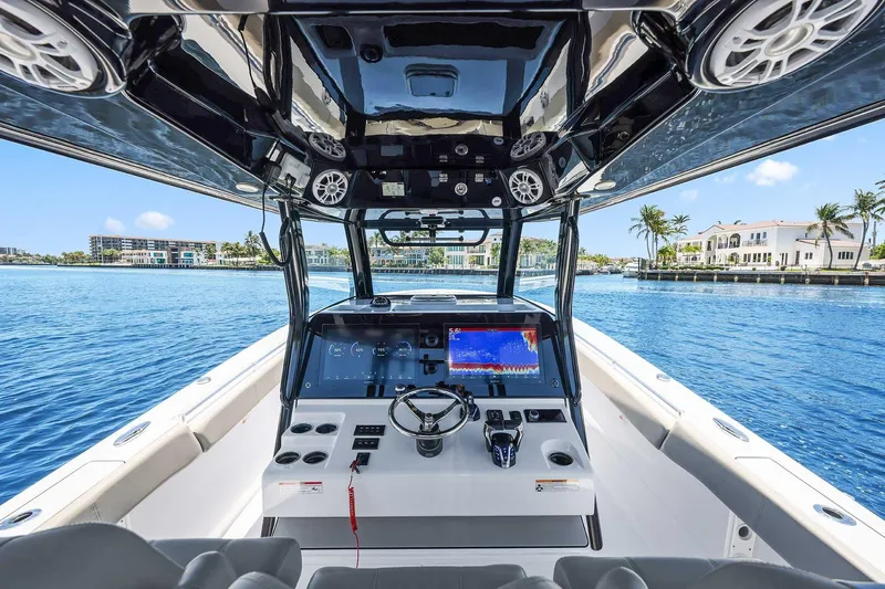 Slide: The Image of 2024 Sportsman Open 352 Center Console boat interior with advanced navigation system. - 25