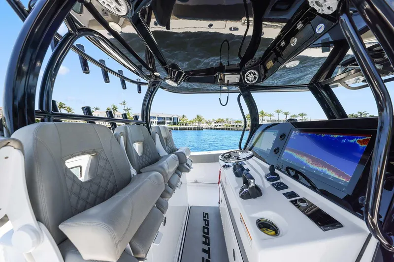 Slide: The Image of 2024 Sportsman Open 352 Center Console interior with advanced navigation system and luxurious seating. - 20
