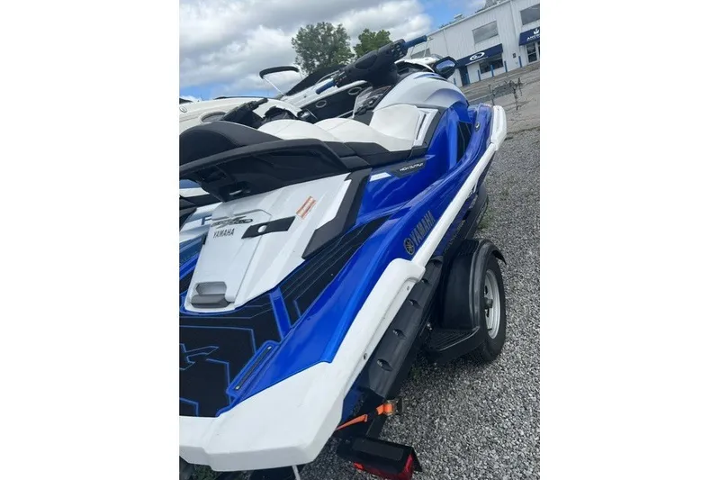 Slide: The Image of 2021 Yamaha WaveRunner FX Cruiser HO in blue and white on a trailer. - 3