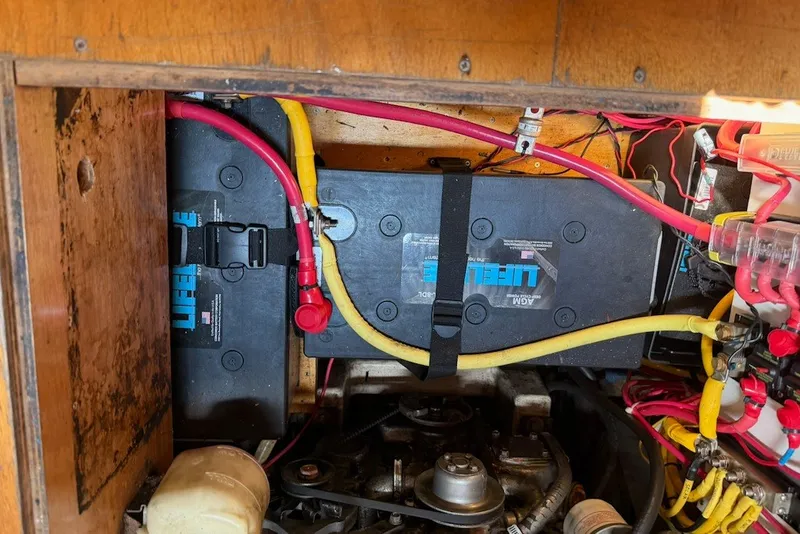 Slide: The Image of Battery compartment of a 2001 Lagoon 410 with Lifeline AGM batteries and wiring. - 66