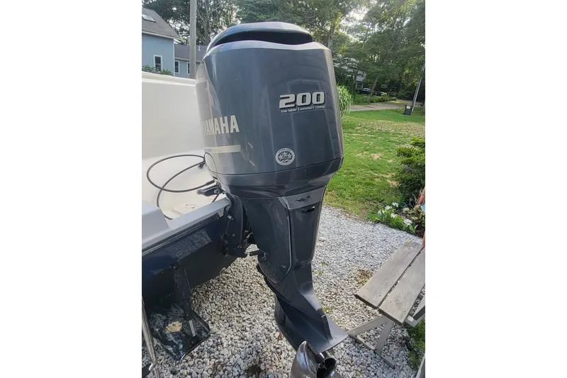 Slide: The Image of Yamaha 200 outboard motor on 2012 Cobia 217 Center Console boat. - 6