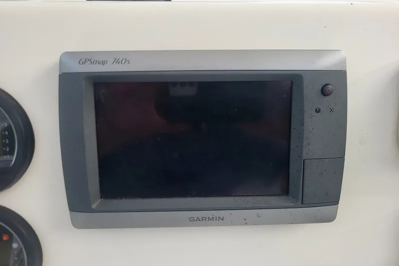Slide: The Image of Garmin GPSmap 740s on 2012 Cobia 217 Center Console boat dashboard. - 21