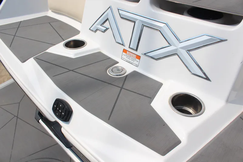 Slide: The Image of 2022 ATX Surf Boats 22 Type-S swim platform with cup holders and logo. - 9