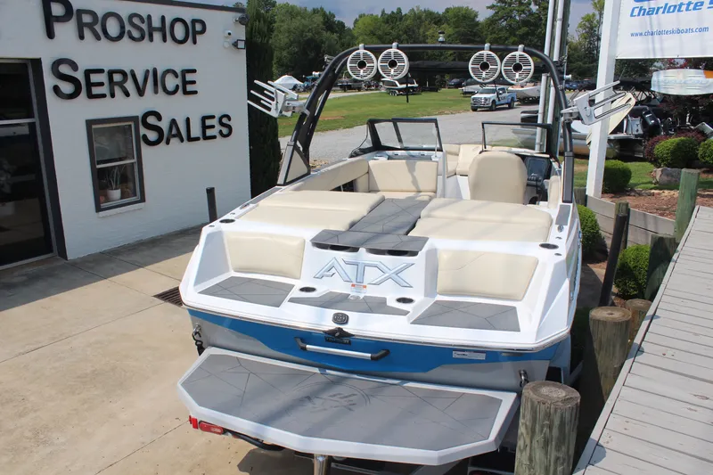 Slide: The Image of 2022 ATX Surf Boats 22 Type-S displayed at a pro shop, ready for sale. - 3