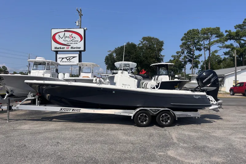The Image of 2023 BlackJack 256 Bay boat on trailer at Marker 17 Marine dealership. - 1