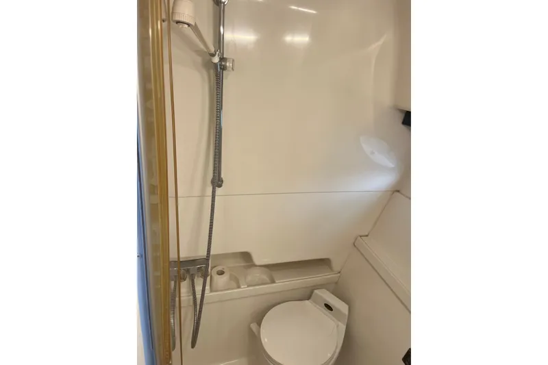 Slide: The Image of Bathroom of 1997 Formula 34 Performance Cruiser with shower and toilet. - 13