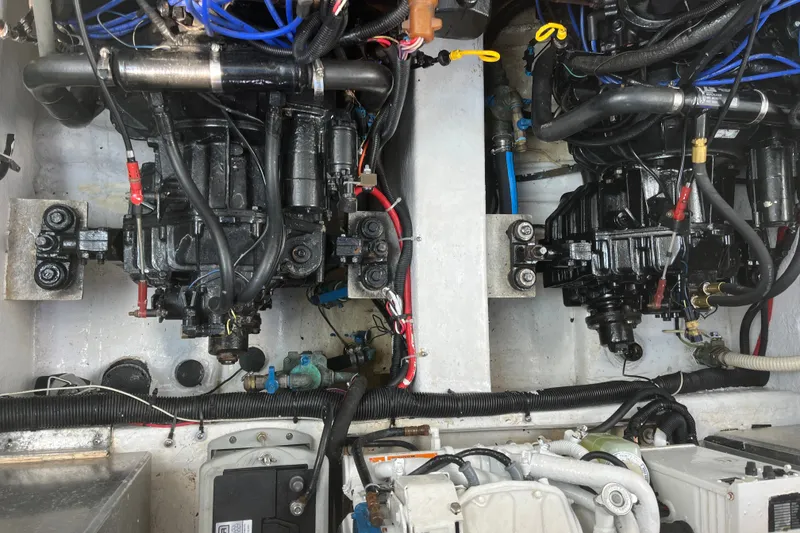 Slide: The Image of Engine compartment of a 1997 Formula 34 Performance Cruiser with visible wiring and components. - 30