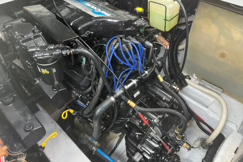 Slide: The Image of Engine compartment of a 1997 Formula 34 Performance Cruiser boat. - 31