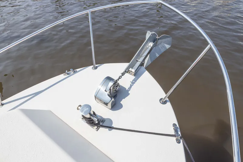 Slide: The Image of Bow of 2019 Rosborough 246 Halifax boat with anchor and railing on water. - 15